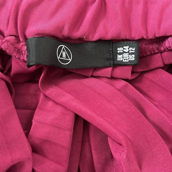 Raspberry color pleated skirt. US size 12 - Picture 3 of 3